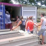 Loading desks bound for PNG in Cairns